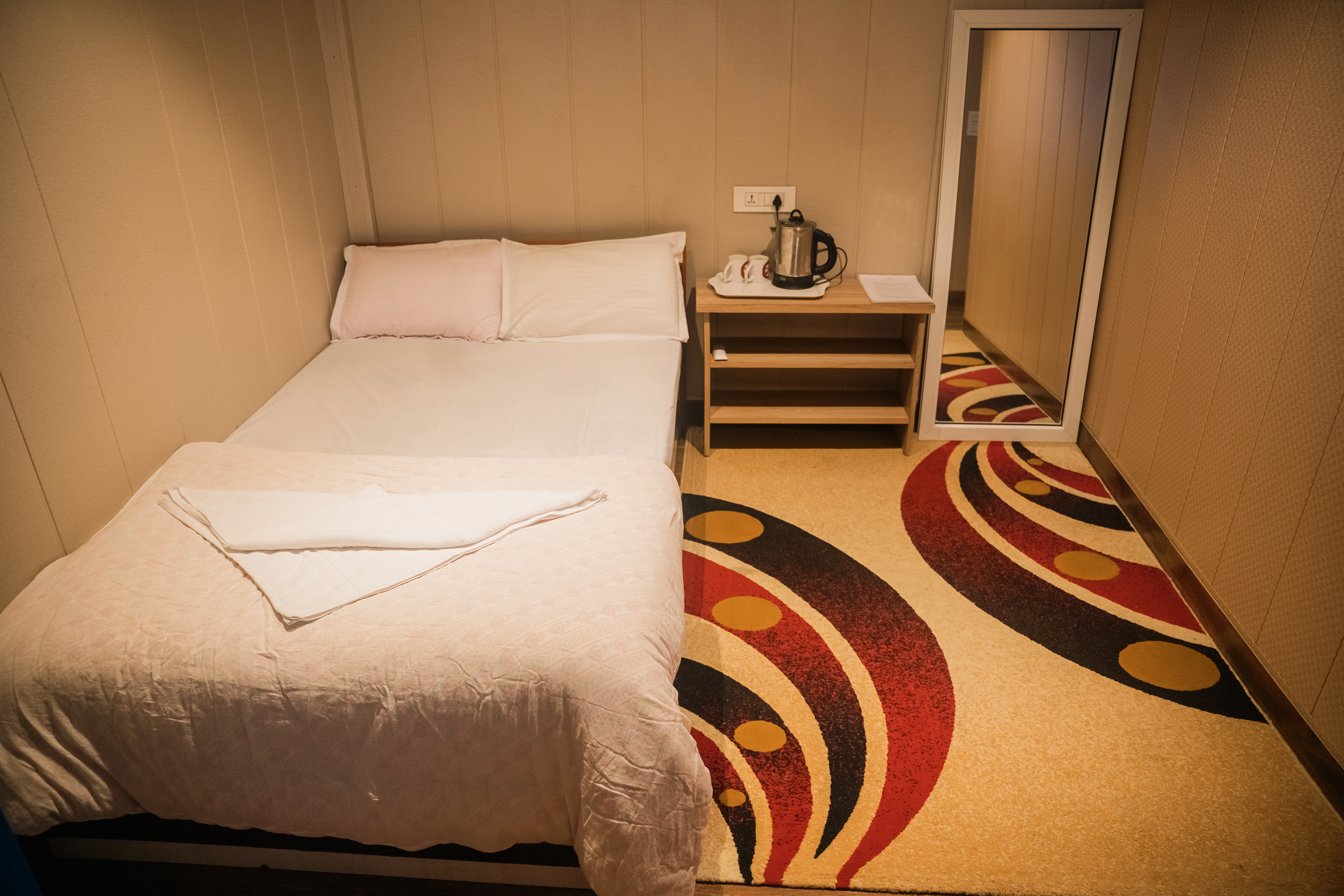 Room at Divine Door — simple, natural light, quiet