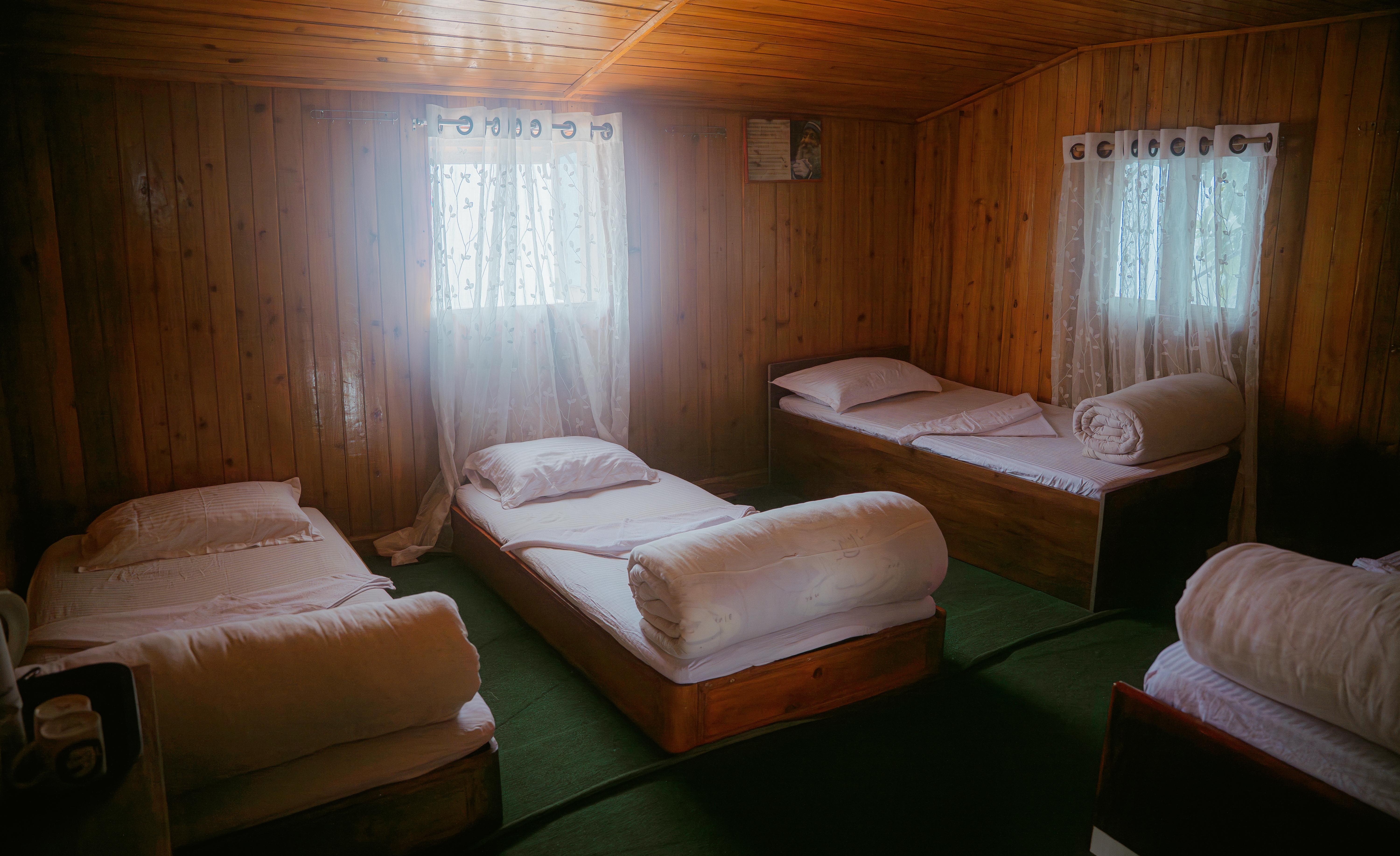 Accommodation at Divine Door — simple rooms, natural light